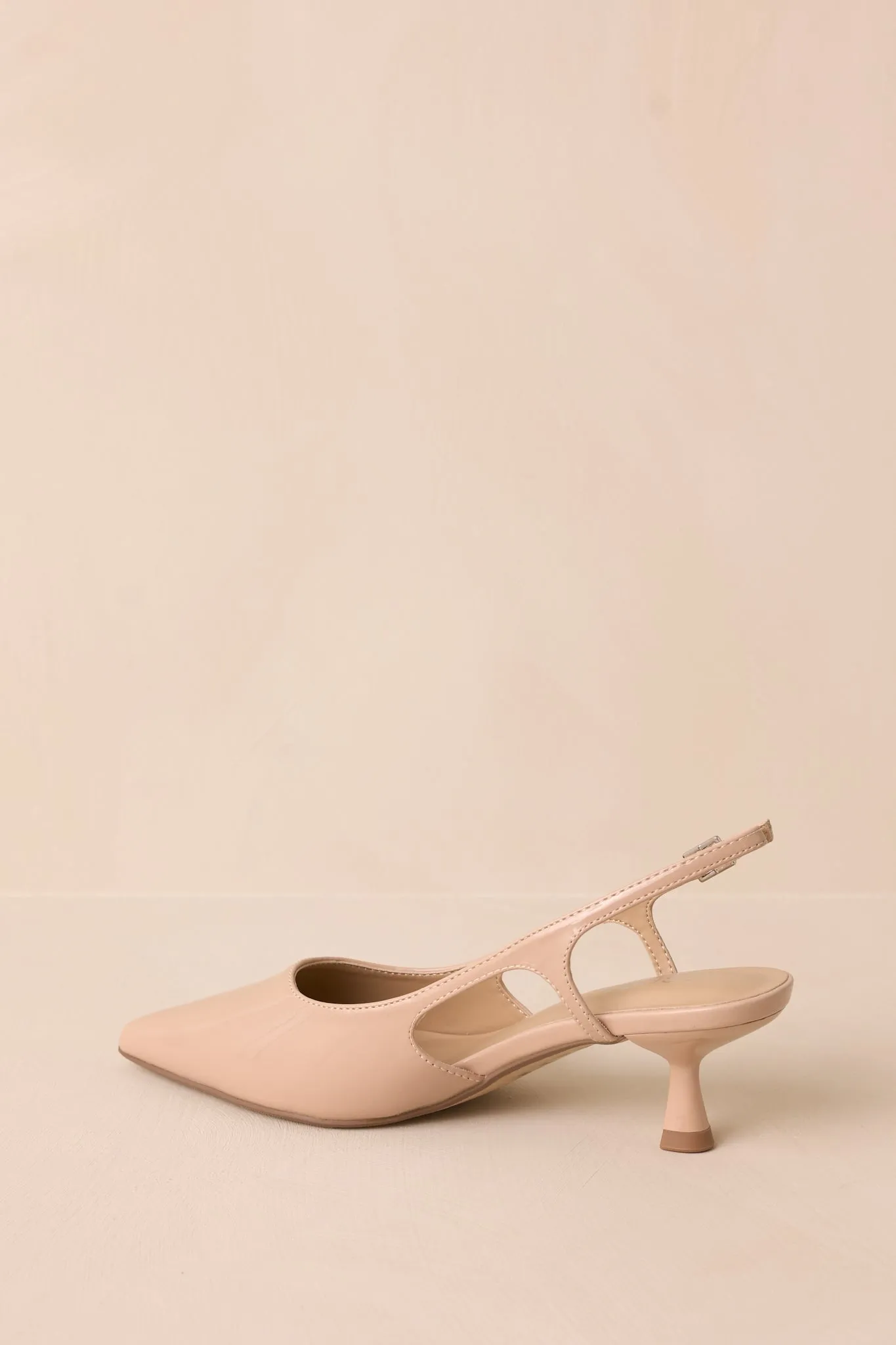 Fiercely Stunned Nude Patent Kitten Heels